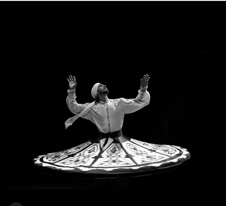Tanoura dancer spinning on stage